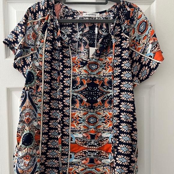 Angashion Women's Summer Tops Casual Floral Print V Neck Ruffle Short Sleeve - Picture 1 of 3